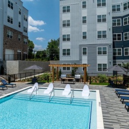 a courtyard with a swimming pool